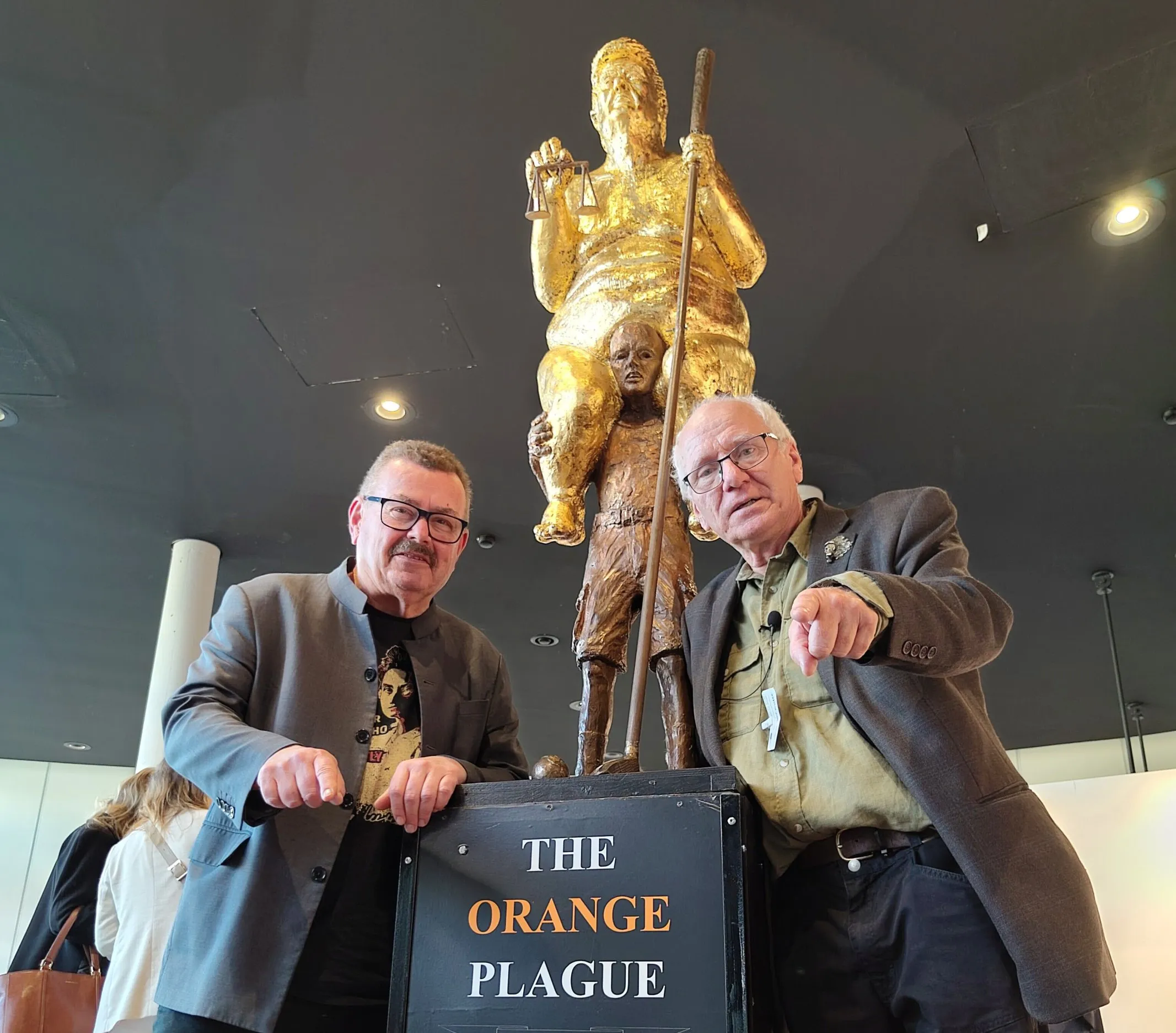 ‘Laughing at a dictator robs him of his strength’: Artist of the gold naked Trump statue explains his message