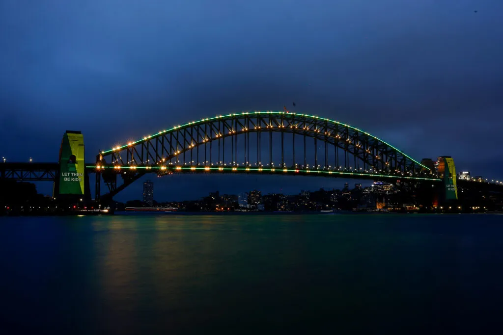 The Sydney Harbour Bridge lit up as Australia’s under-16 social media ban came into effect