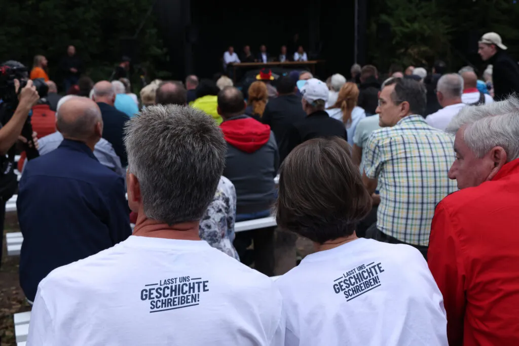 AfD supporters at a campaign event in Dessau-Roßlau, Aug. 19, 2026